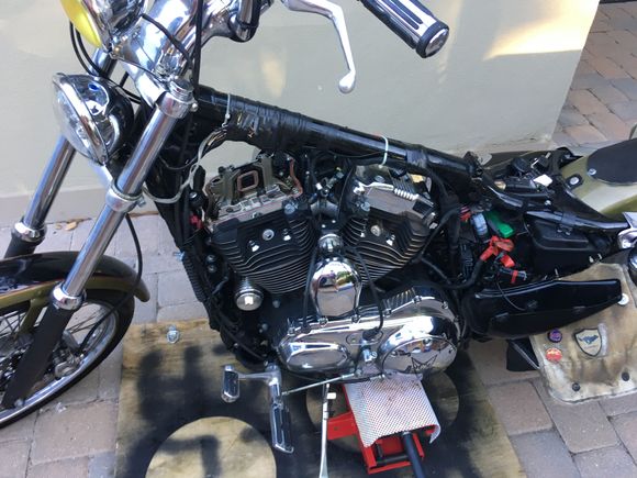 Rear wheel off ground, both plugs out - rotated rear wheel to 5th and front cover off.