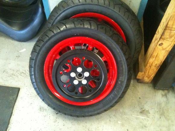 the rims and frame went red. when i saw the rims, before all the stuff was bolted on, i thought it was too much. but, with all of the pulleys and rotors, i was put back at ease.