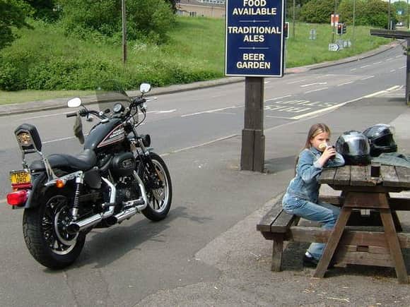 my first harley sportster 883r with my daughter hannah sat outside the pub near matlock derbyshire