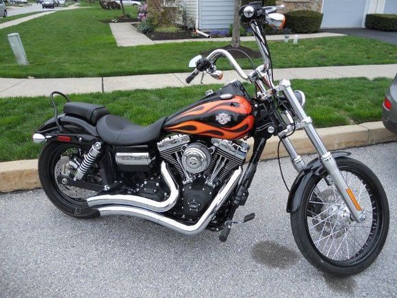 The wideglide upgraded with V &amp; H Big Radius', Power Commander V, Screamin' Eagel Pro air cleaner, 12" mini ape hangers, HD flame handle grips, Willie G. Skull a/c insert
