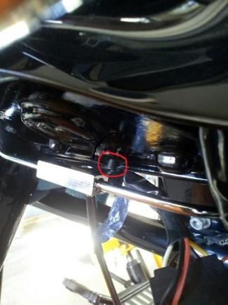 On 2010 RK's there is a small metal post where the new brake line connector is supposed to connect to the frame, however, the Drag Specialty brake line doesn't have an indent to fit around the post so there are two options: 1) grind down the post, 2) insert a 3/16" thick spacer between connector and bike.  I chose the spacer and it seems to be working good.