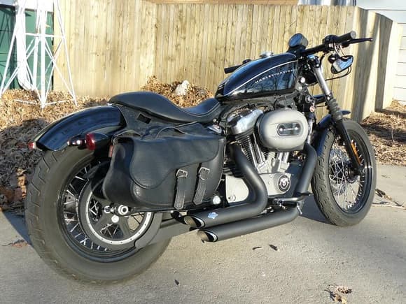 Here it is.  33.5&quot; Flanders drag bars with a 4.5&quot; pullback, Vance and Hines black Short Shots, Power Command III, kick-a$$ saddle bags.
