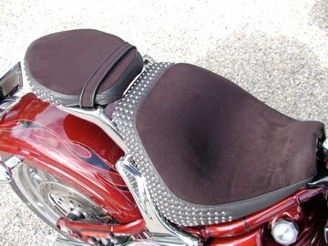 Top side is suede - cooler in the summer &amp; warmer in the winter. Also great traction. Memory foam is more comfortable than gel (IMO).