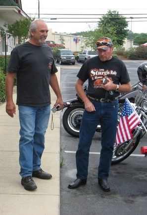Me and John TN back in June 2007 handing off the HDF Mascot in Rome, GA