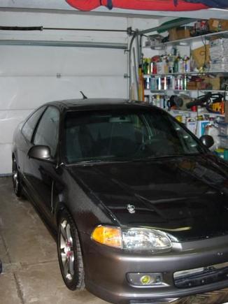 this the best picture i could get of the car in the garage, carbon fiber hood and fenders with paint faded into them, 17" konigs previous owner put on