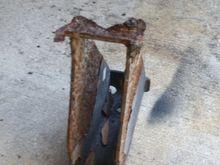 Whats left of our side steps. One bracket saved as a souvenir lol it was totally rusted out. It was a pain tonget these brackets out, 4 or 5 per side. 