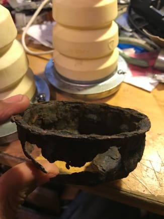 rotted out original cup that fell off the H2 chassis