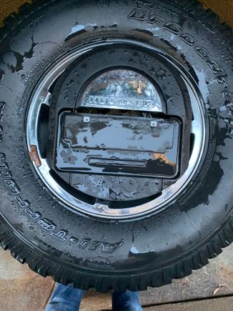 Spare tire with license plate holder