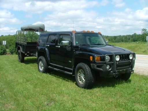 H3 and M101A1 Trailer
