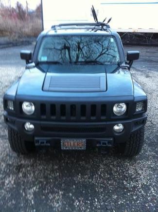 GRILLE WAS FACTORY CHROME. BOUGHT SPRAY IN BED LINER AT AUTO ZONE.