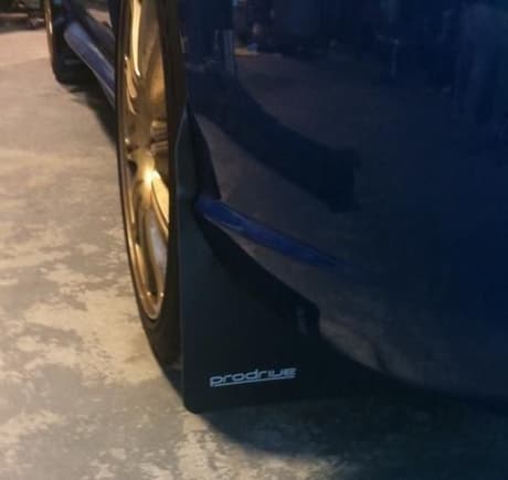 Just put on my new Prodrive mudflaps... :) Phone pic while still in the shop sorry :/