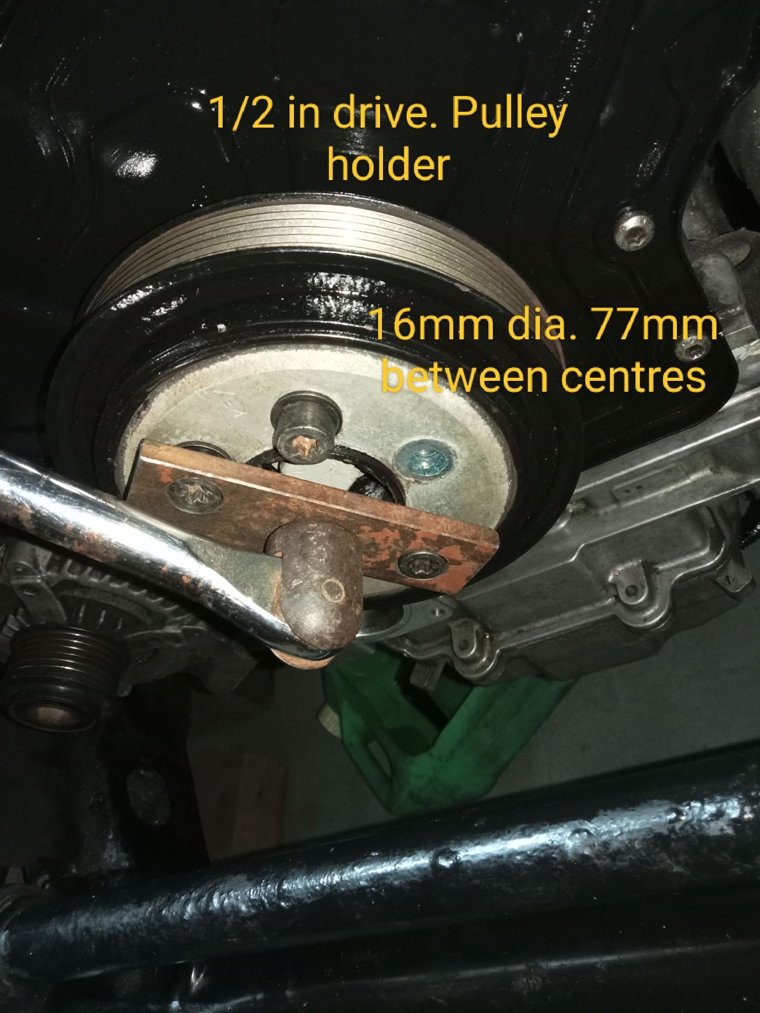 Crankshaft pulley holder from 8 x 40 steel bar.