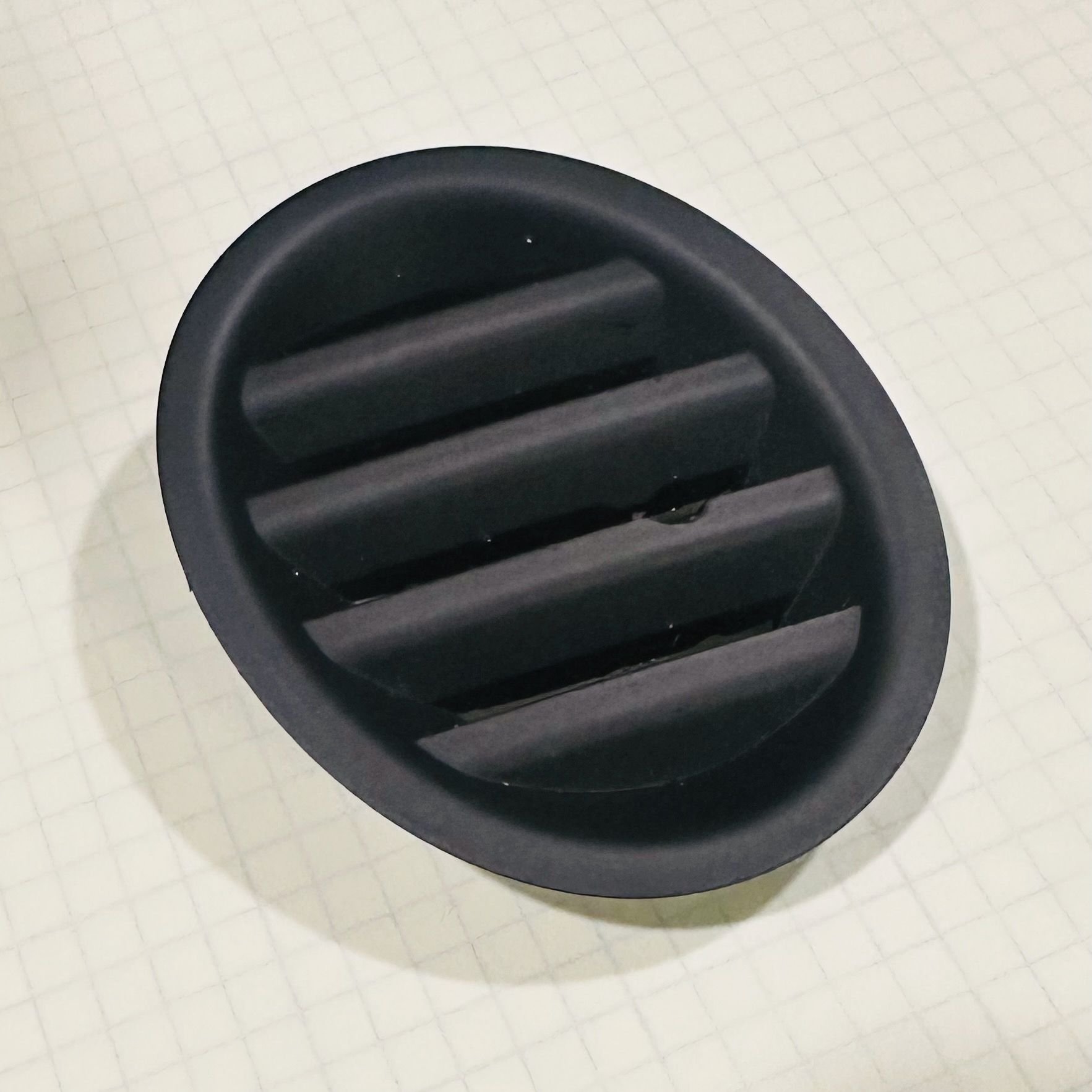 The original Left vent cover 