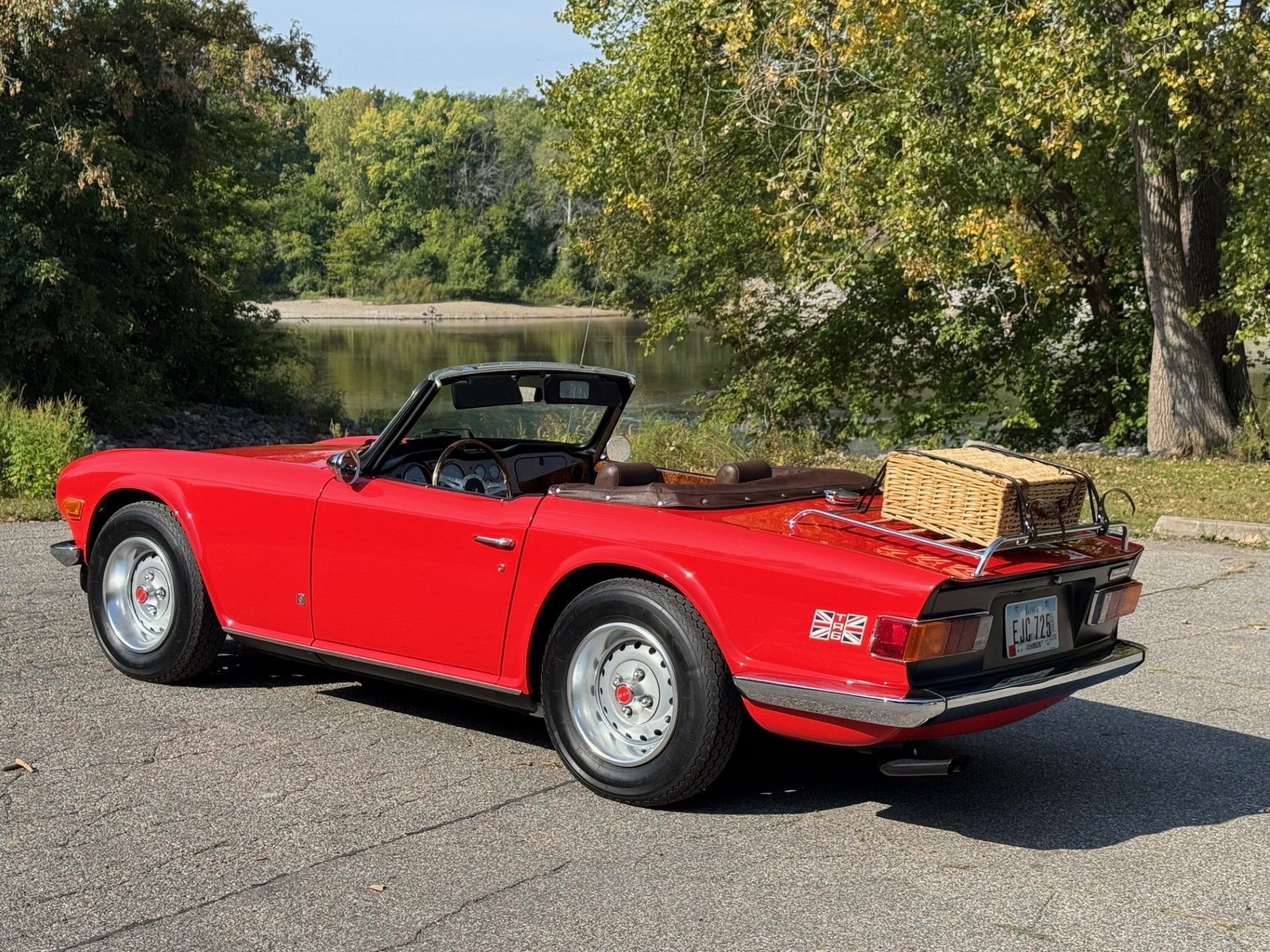 It was a neat little convertible for picnics and outings. She sported her original Pimento Red body color and the seldom seen Chestnut brown interior.