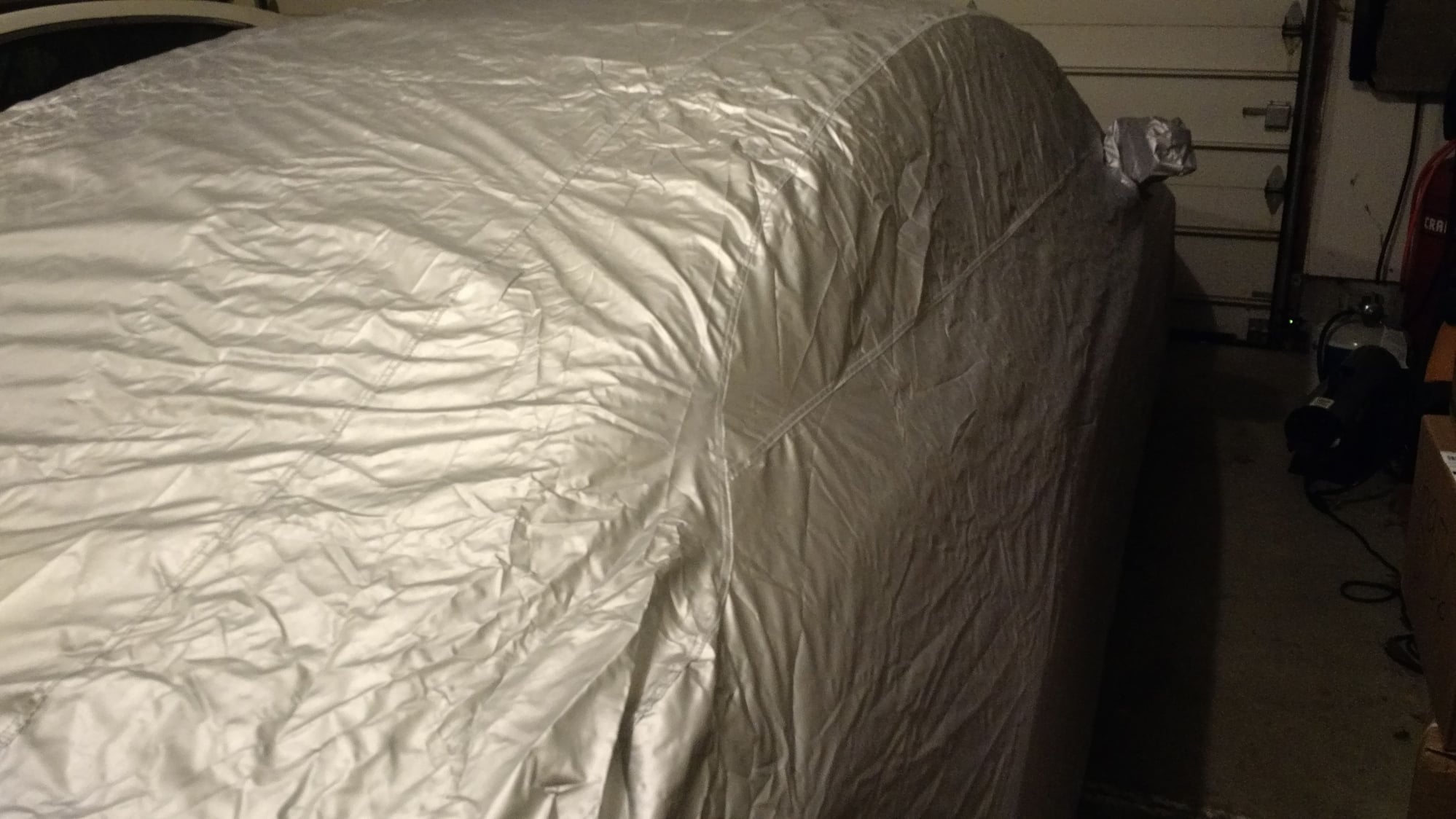 Found a decent indoor/outdoor custom fit car cover for $119