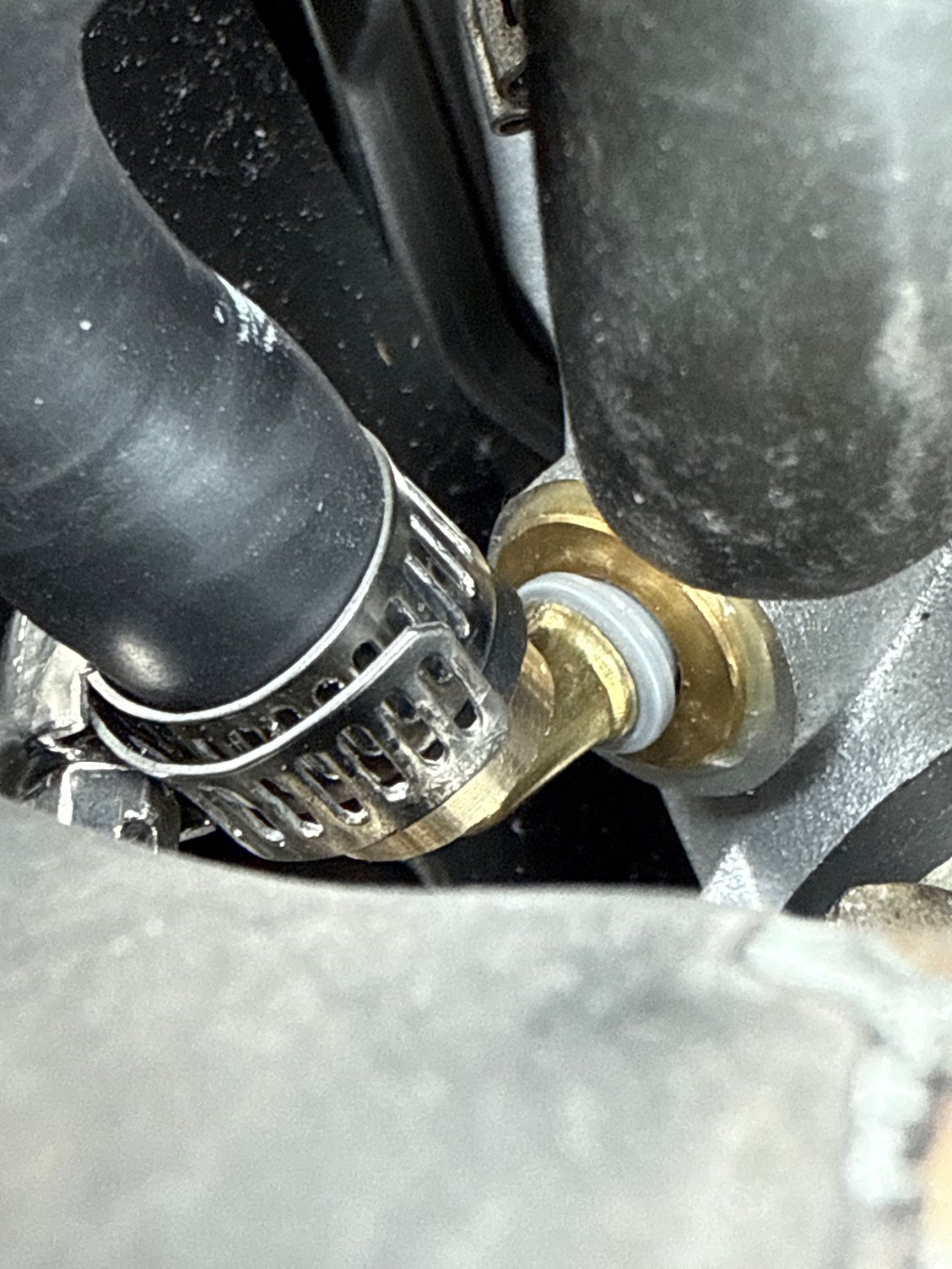 Horrible angle but hopefully shows it clearly enough. It also changed colour from black to grey since I dropped the black one (which came with the new water pump) - fortunately the brass fitting also came with a replacement (the grey one)