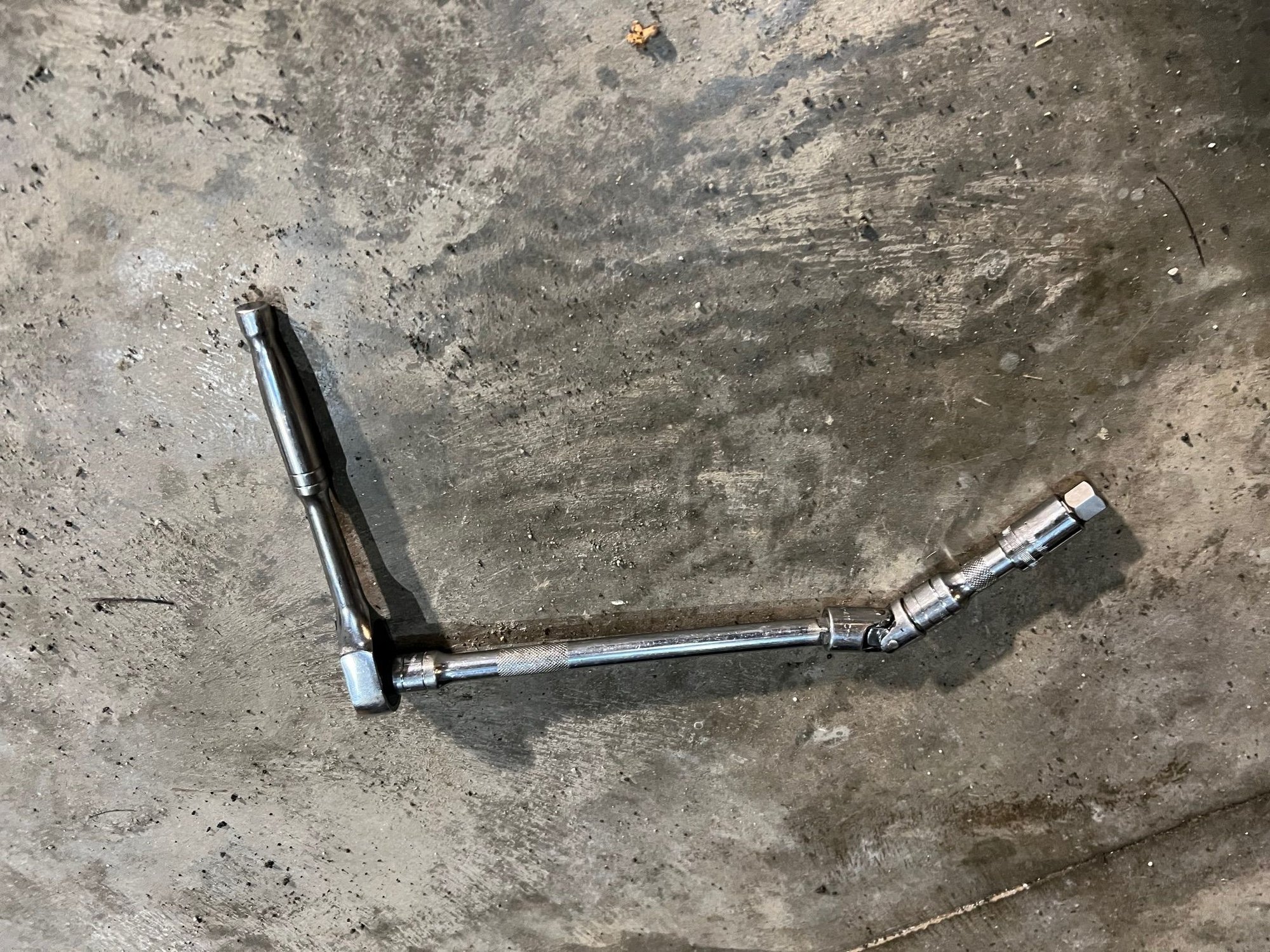 Once cracked drain plug used this setup to remove.