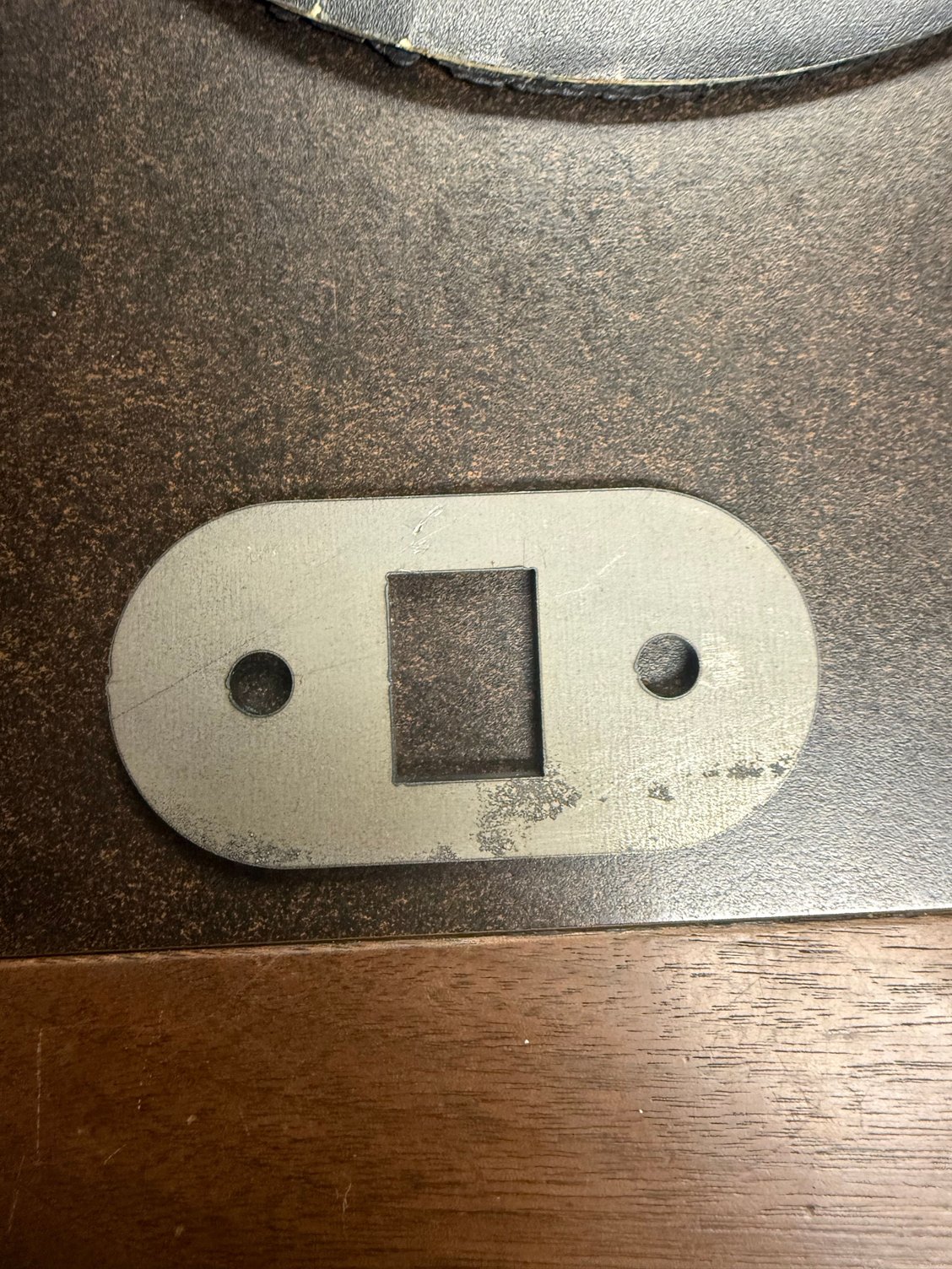 Steele check arm plate 
