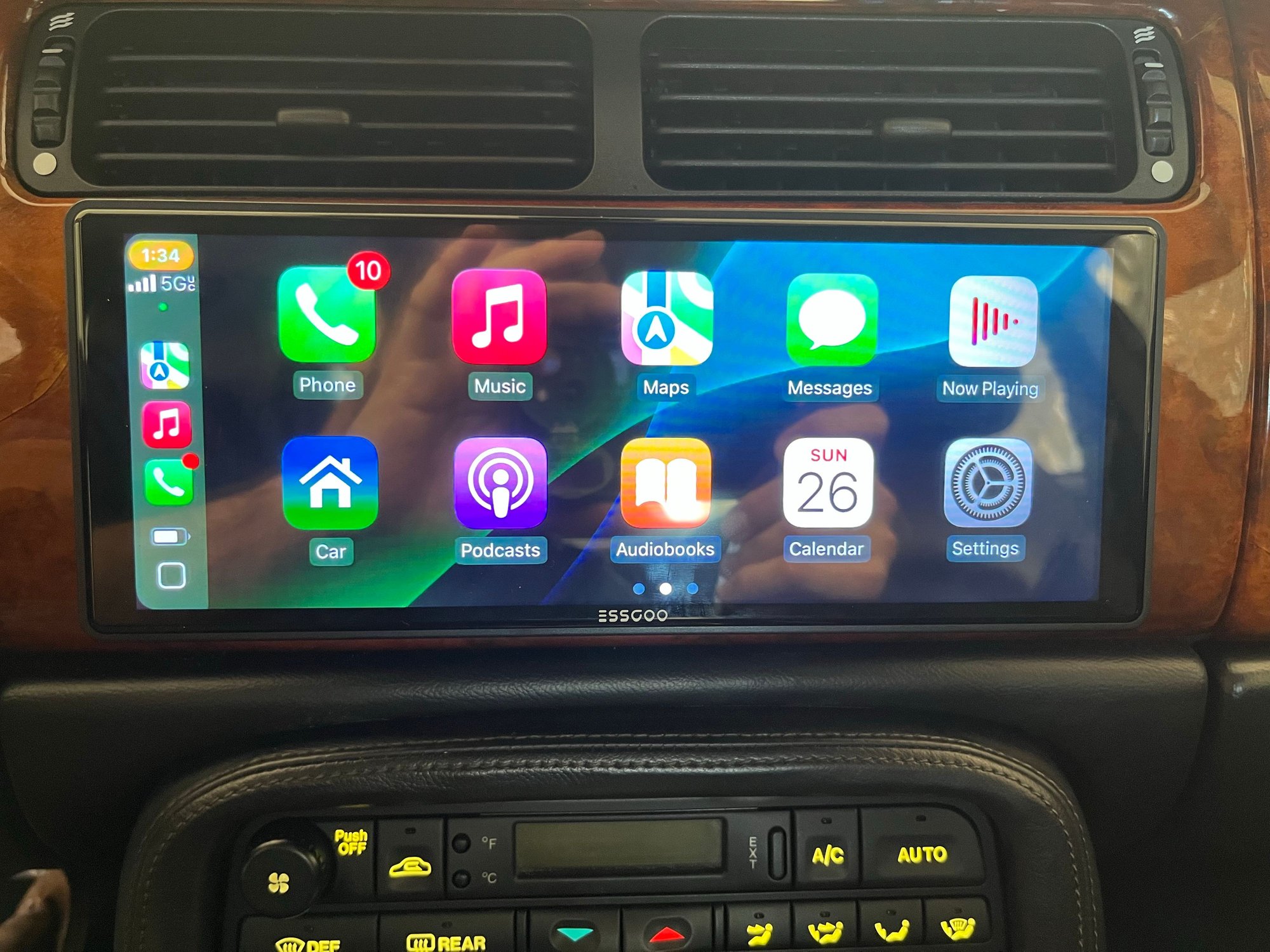 Carplay mode (once it connects to your iPhone, it automatically goes into Carplay). You can return to the systems home via the 