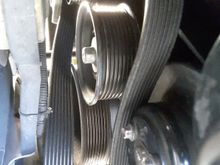 Drive, idler and tensioner, with old belt.