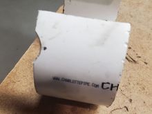 PVC sleeve for press backstop. Made from 4in pipe. Note the notch to accommodate bump on the subframe.