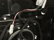 I have wired a positive wire to the door wiring that is pin #13 and a negative wire to pin #12. This is to feed the Cree LED projector you have chosen to light your way.