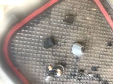 Metal shards, And two plastic pieces.