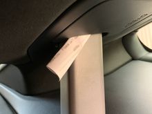 This area seem flimsy and the cover is loose. Tap it with your finger and it will rattle. Stick a shim in there to see if it is relevant to you