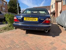 The view of the new tail pipes on the car.