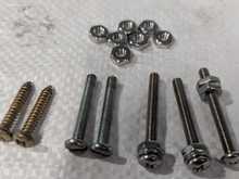 ST screws for horn push on left.
Then 2 Jag screws, then better version. On right the shoulder screw.