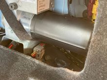 The access port in the trunk, RH side.