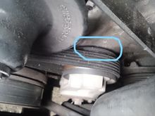 Same with main belt tensioner pulley, sits very close to timing chain engine cover.