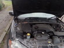 et voila.  I managed to get a replacement bonnet for 90GBP but if you want to repair the damaged bonnet you could.  Remove the old, hacked catch assembly (two screws) then fibreglass a patch to the inside of the top edge.  source and fit a new catch assembly.