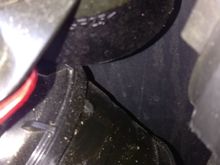 The bottom of the canister is in top of the picture. The plastic "tube" in the lower part is the air intake. Not easy to see the "film" of grease there, but there are some that looks to have been sprayed on (no sign of dripping).