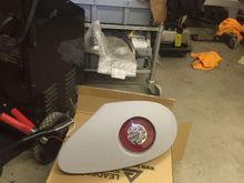 Epoxy tube and light into assy.  Sand edges of tube flush with lens.  Bondo imperfections, sand, bondo, sand, bondo more sand more prime sand prime sand until perfect.