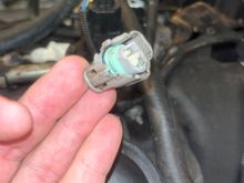 This brittle connector broke off. It plugs to a sensor on the right hand charge cooler.

Does anyone know the part number? 