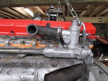 The hose is very important as it has a small take-off on it that provides the suction for the dizzy vent system. It is NLA, if yours is shot then get a hose of the right size with a 90 degree and and use one of these for the takeoff:
https://www.viperperformance.co.uk/hose-plugs-blanking-caps_10103_self-seal-take-offfor-silicone-hoses.html