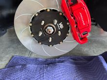 Front caliper back on