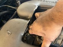 This is the supercharger slide all the way forward and snout tilted down, it can tilt further but eventually that bottom bolt hole hits the charge coolers
