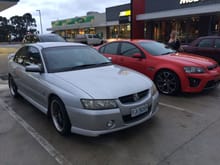 MY SV6 VZ COMMODORE AND MY DAUGHTERS RED VE COMMODORE. THE VZ HAS 5 SPD AUTO AND PADDLE GEAR CHANGE.