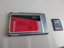 hama 31-in-1 PCMCIA to Secure Digital Adapter Frontside and as sample SanDisk SD Card 1GB card