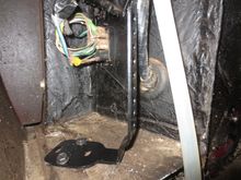 The actaution cable used the grommet thatthe huge loom cable has to enter the engine bay. Mine being a RHD car, but usingthe Left side would be the same. The unit was mounted upright.