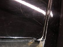 Signs of cosmetic repairs to the scuttle
