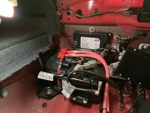 From the front of the trunk, looking towards back right corner of the car