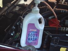 Old Shower Gel Bottle with Pump Dispenser to Top up the Power Steering Fluid the Easy Way