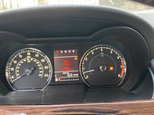 The hood is closed, the roof is not! Gotta love the Queens English! 