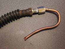 This will temporarily seal your Brake Hose up and you can buy these fittings at almost any Car Accessory Shop