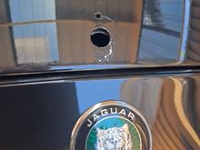 The result of removal of the Leaper, 3 holes and damage to the paintwork  and a slight indent from someone who fancied the THING.
Next is bonnet off and to the repairer. :) 