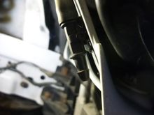 This is where you disconnect the headlamp washers water supply before dropping the bumper cover.