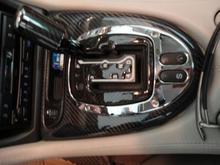 Graphite and polished aluminum gear surround from Mina Galleray,.